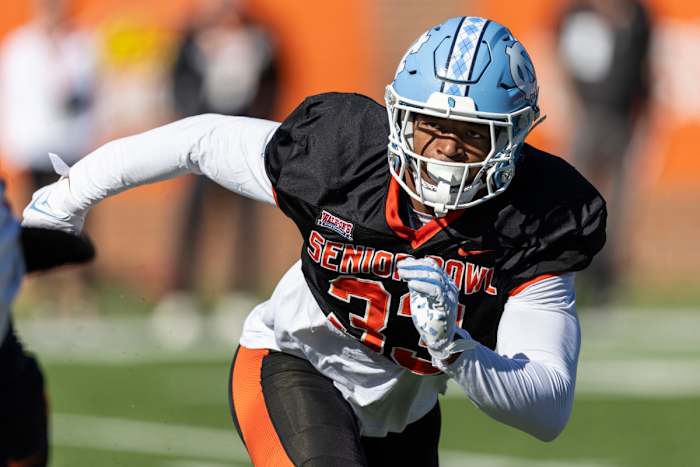 National linebacker Cedric Gray of North Carolina (33) works in coverage during practice for the National team.